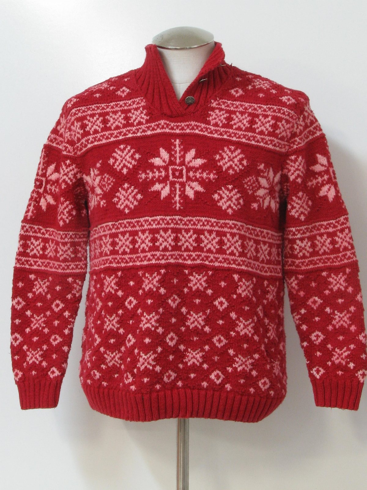 Ugly Christmas Sweater: -Ralph Lauren- Unisex Red background cotton  pullover longsleeve ugly Christmas sweater, fold over collar with Fair Isle  style snowflake pattern. Pattern continues on back. Color bleeding  throughout sweater. (made