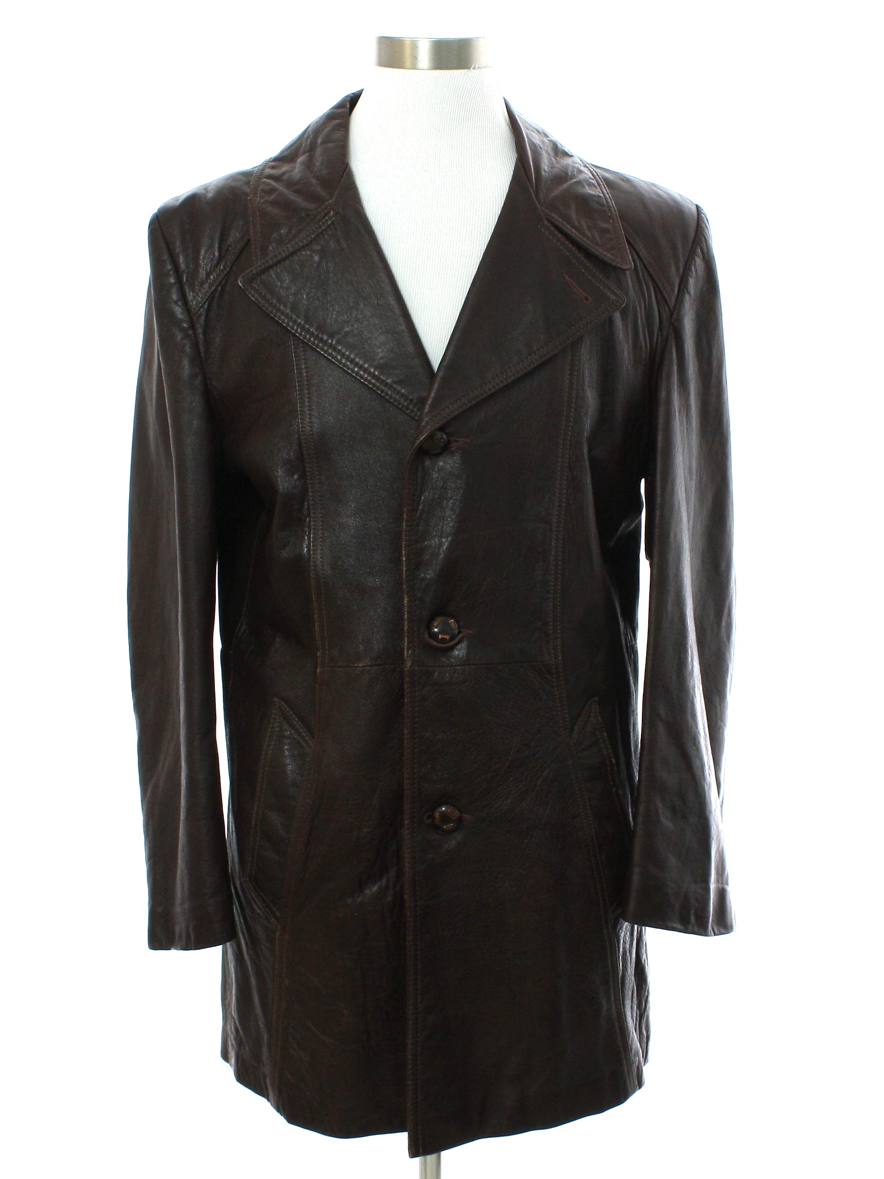 70 s Grais Leather Jacket 70s Grais Mens dark chocolate leather longsleeve 3 button front closure mod leather car coat jacket. Grained texture straight seams in front and princess seams in back tape...