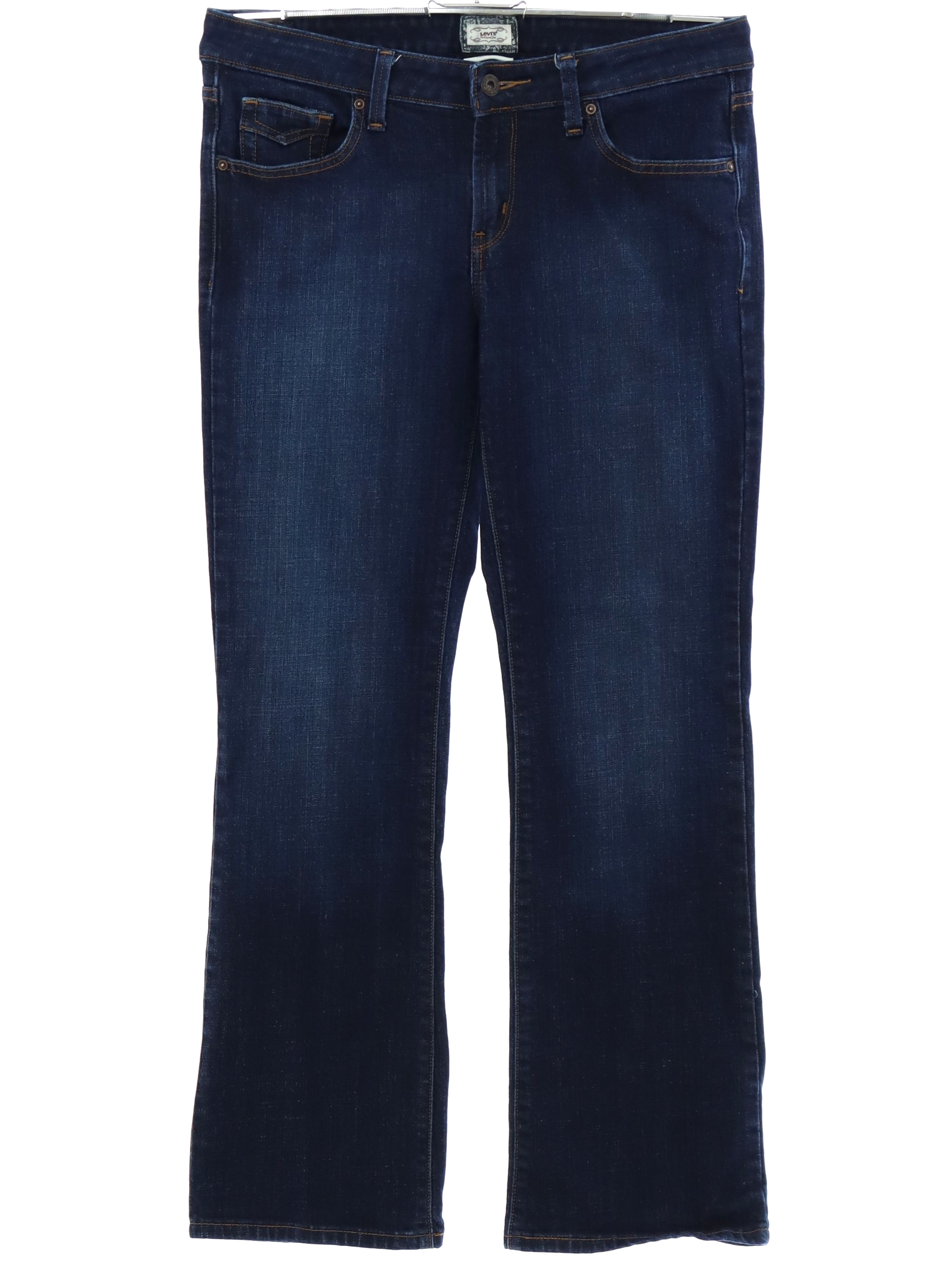 Flared Pants / Flares: 90s (2010) -Levis Womens dark blue background cotton and elastane denim with dark topstitching, style 545 pocket low rise 18 inch flared jeans pants with