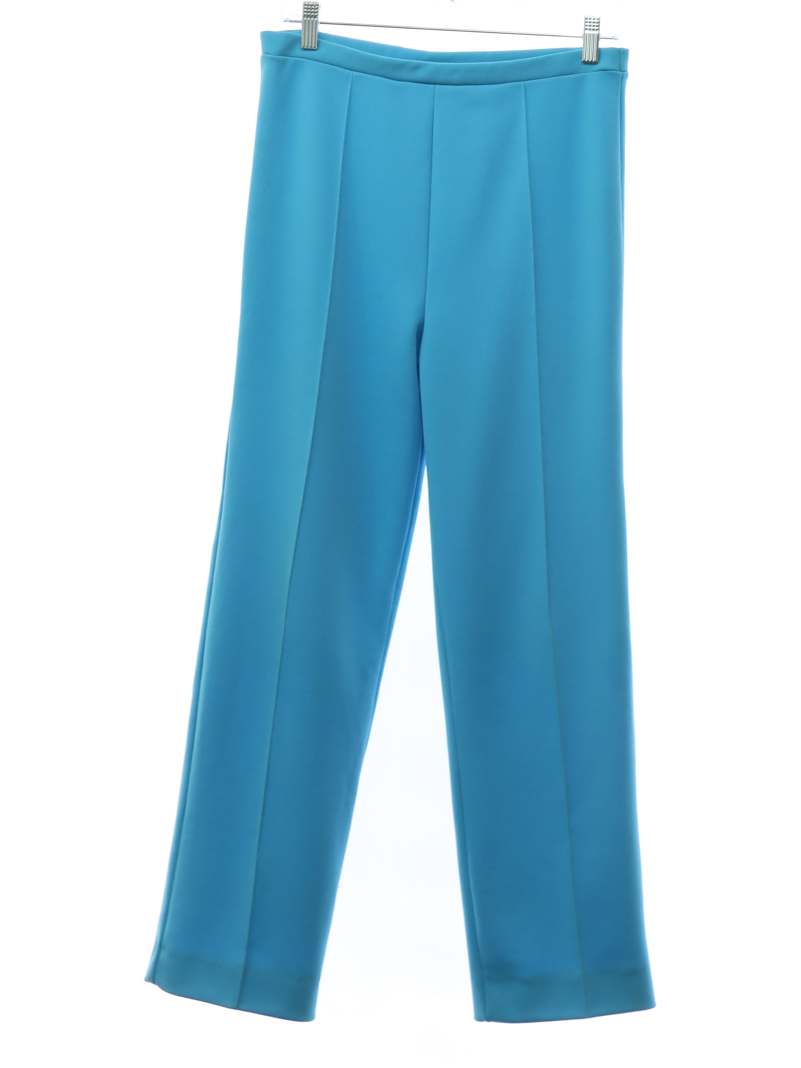 Vera Seventies Vintage Pants: Late 70s or early 80s -Vera- Womens sky blue polyester  knit pants. Classic style with stitched creased straight legs, banded pull  on waistband, no pockets. Faint light brown